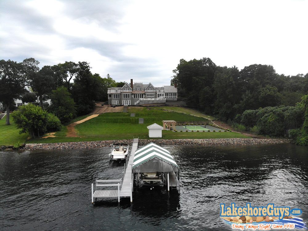 Riprap shoreline with boat house and dock on Lake Minnetonka