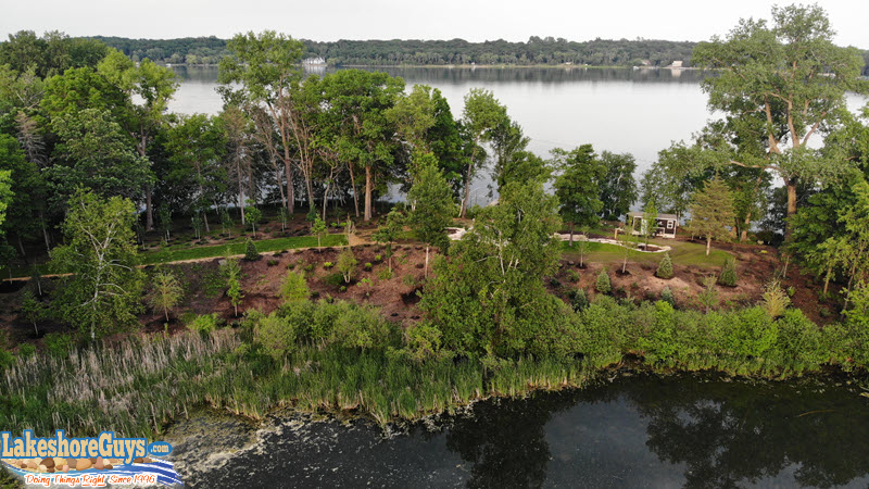 Native plantings and natural shoreline on peninsula in Stillwater, MN